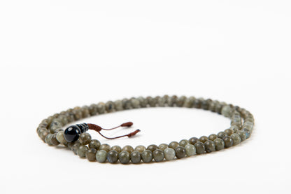 Labradorite beaded mala on white background