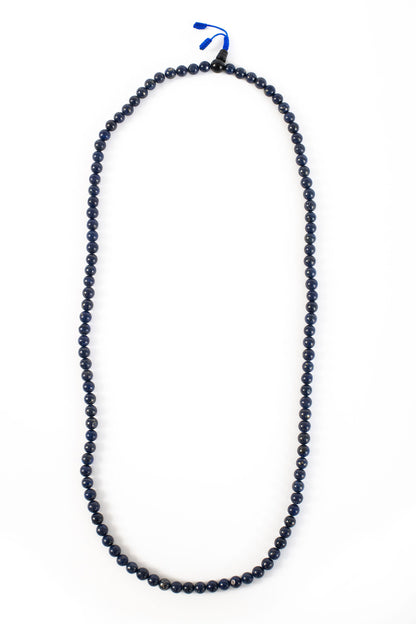Lapis beaded mala on white background