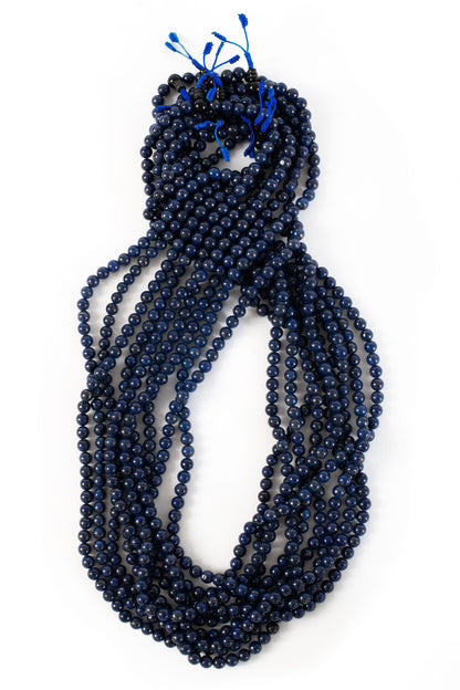 Lapis beaded malas on white background